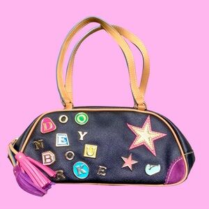 DOONEY & BOURKE - Limited Edition Lindsey Lohan
Baguette